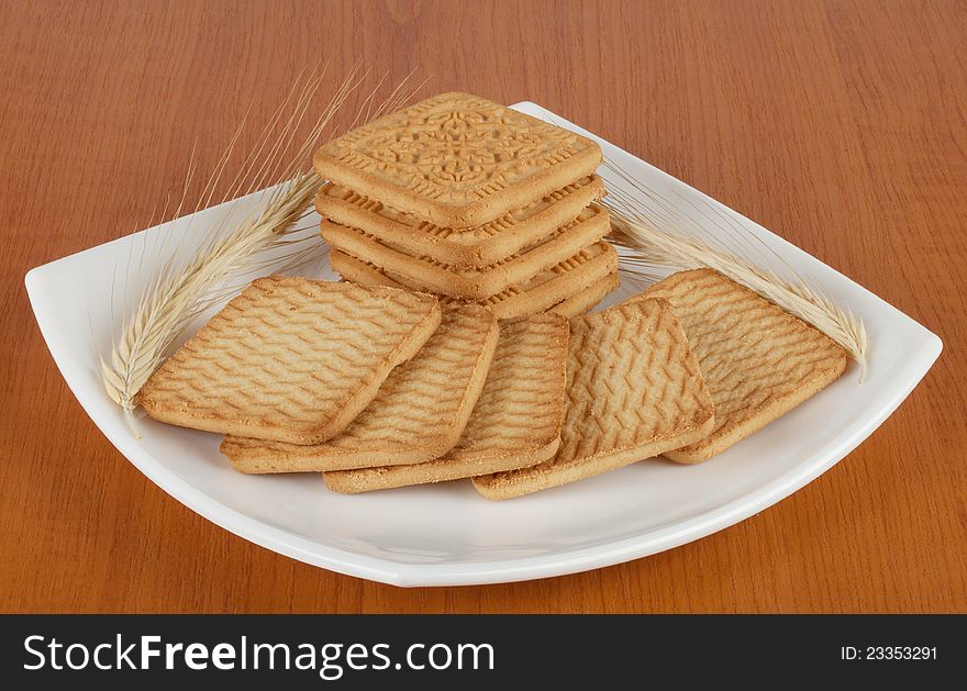 Cookies with spikelets on a white plate