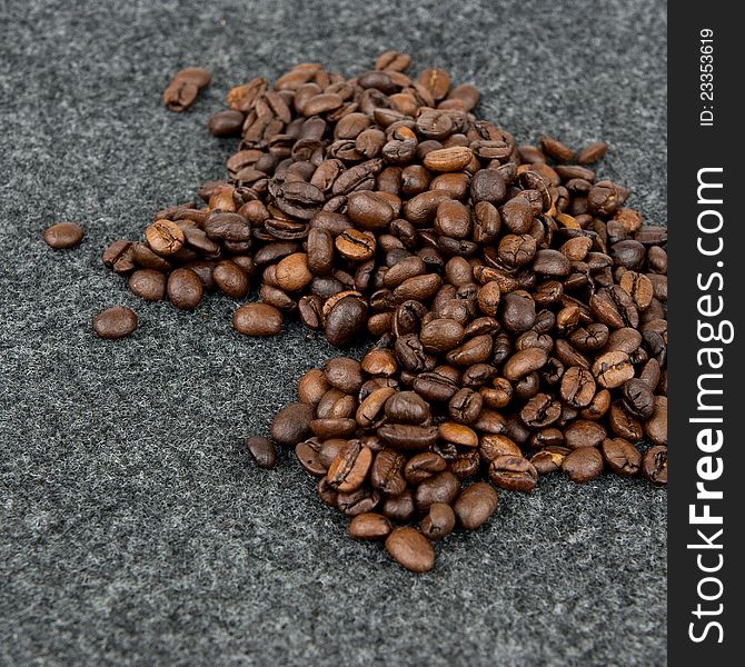 Coffee beans  on a grey background