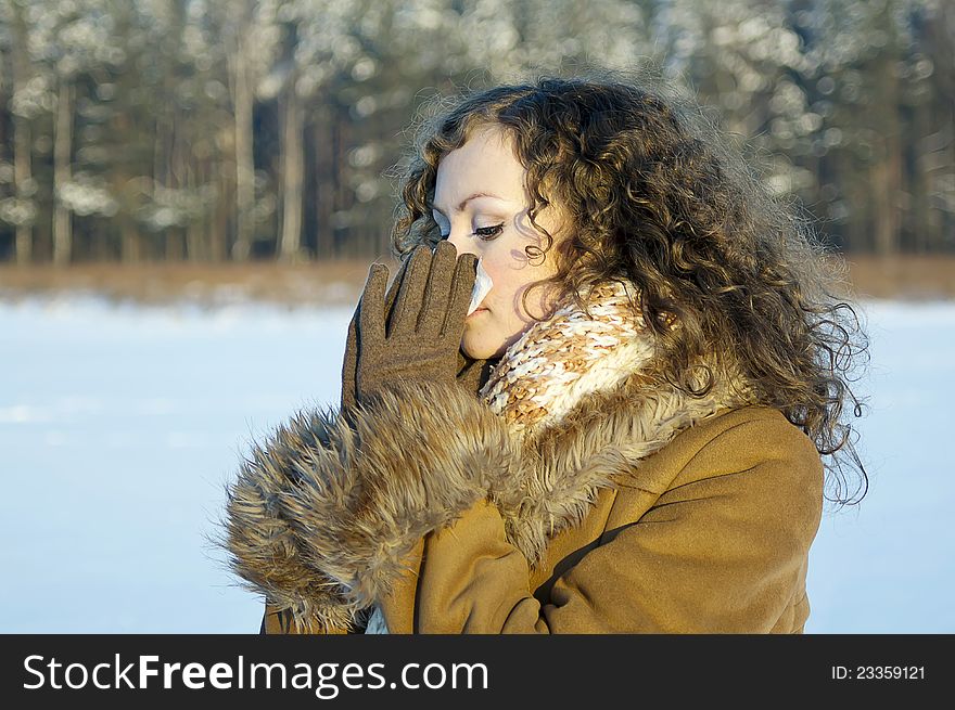 Cold in the winter the beautiful girls on the nature