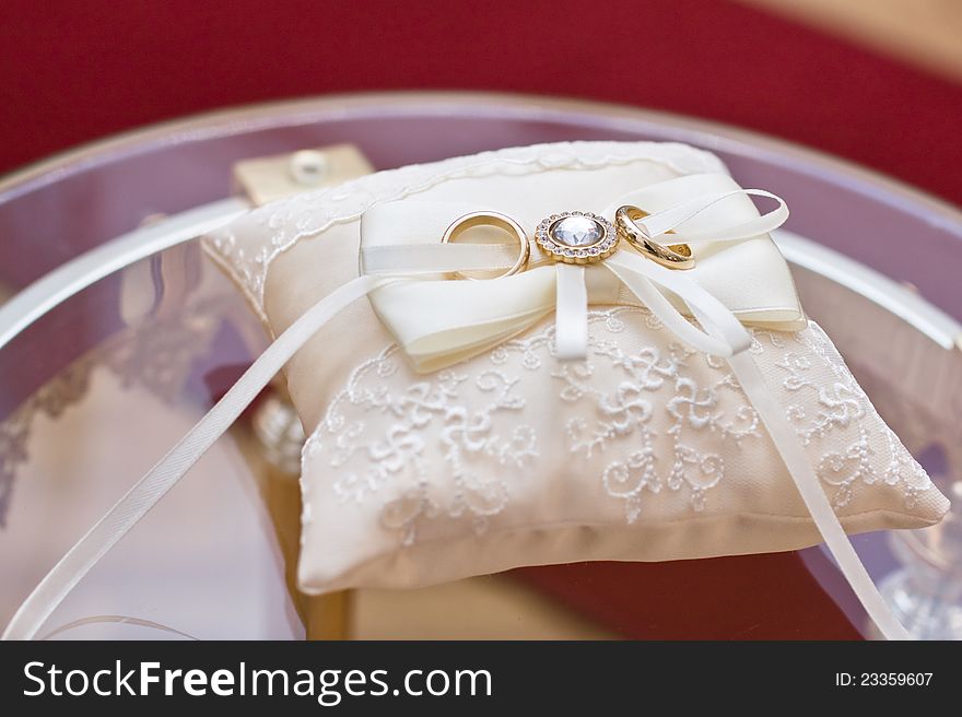 Wedding rings on the pillow during the process of wedding registration