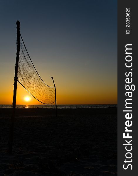 Volleyball net against the background of sunset in India. Volleyball net against the background of sunset in India