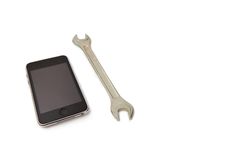 Cell Phone And Wrench Stock Photos