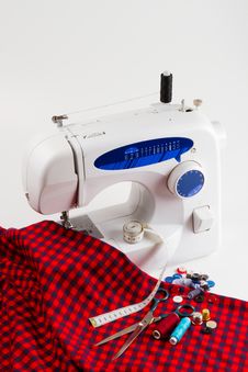 Sewing Machine With Red Cloth Stock Image