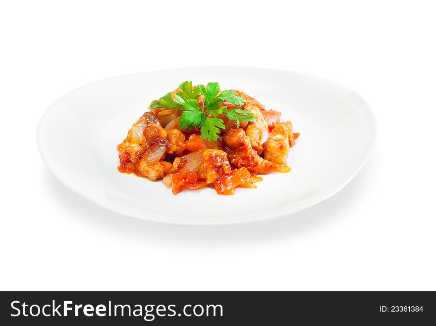 Stewed vegetables with meat on a white background