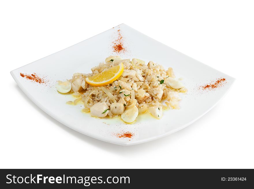 Rice with seafood and quail eggs on a white background