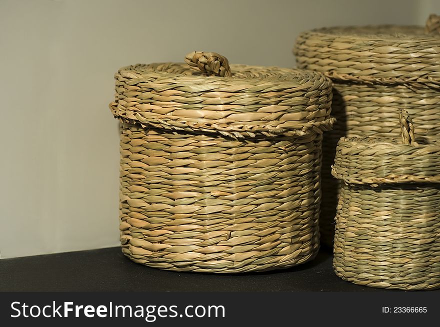 Three storage baskets in different shapes.