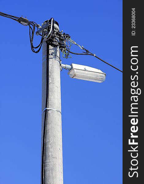 Concrete post with lamp