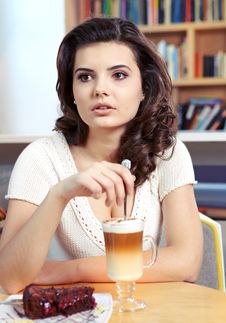 Student Woman With Cake Royalty Free Stock Photography Student Woman With Cake Royalty Free Stock Photography