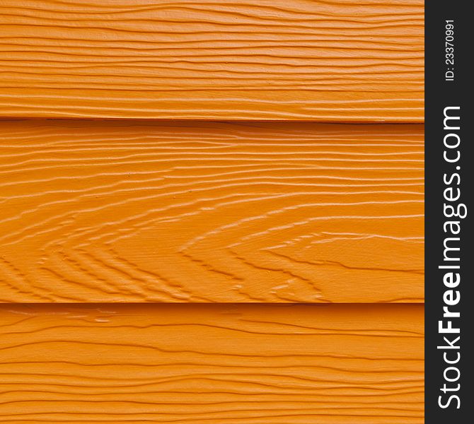 A take orange wall wood colorful. A take orange wall wood colorful