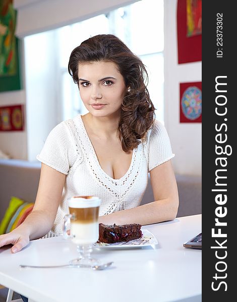 Student woman in cafe bar