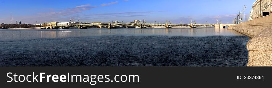 Panorama of the Troitsk bridge in St.-Petersburg in clear spring day