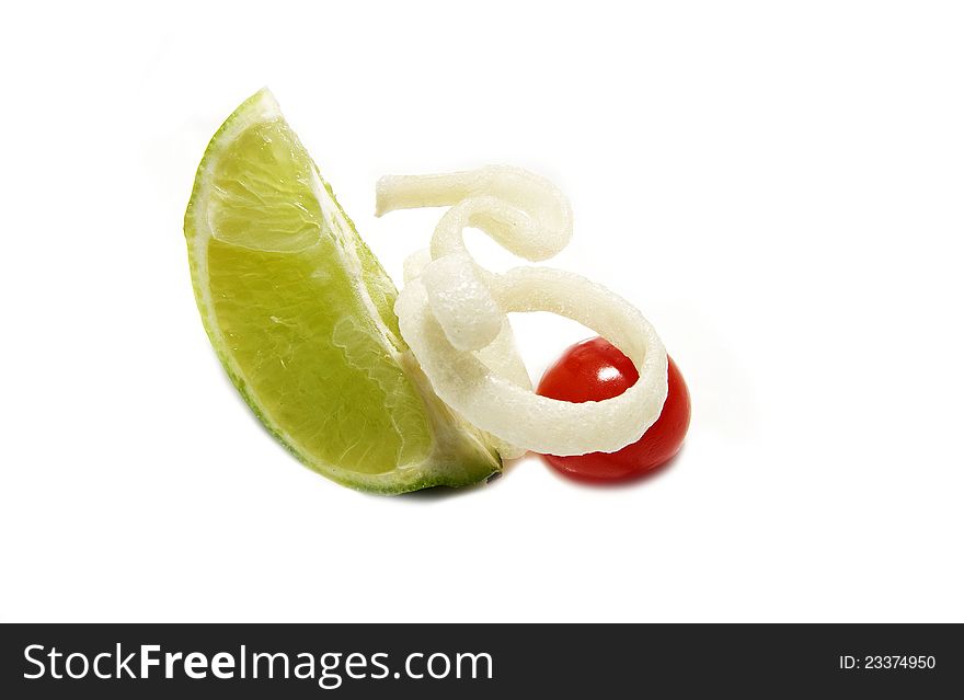 Composition of lime fruits and tomatoes on a white background. Composition of lime fruits and tomatoes on a white background
