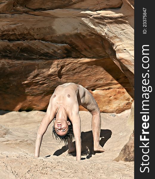 Nude Woman In Bridge Stretching Pose