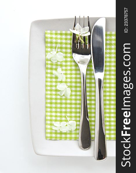 Spring table place setting with knife and fork