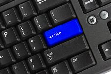 Black Pc Keyboard With Blue Like Key Stock Image