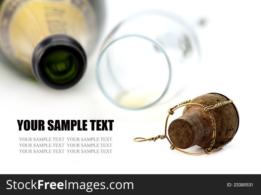 Cork, champagne glasses and bottle on white background