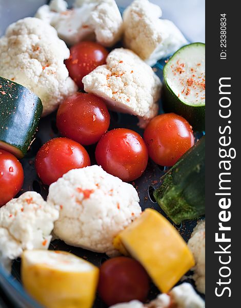 Fresh vegetables in electric steamer closeup. Fresh vegetables in electric steamer closeup