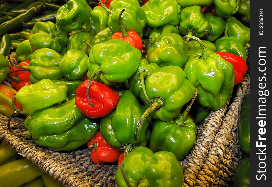 Green and red peppers in supermarket