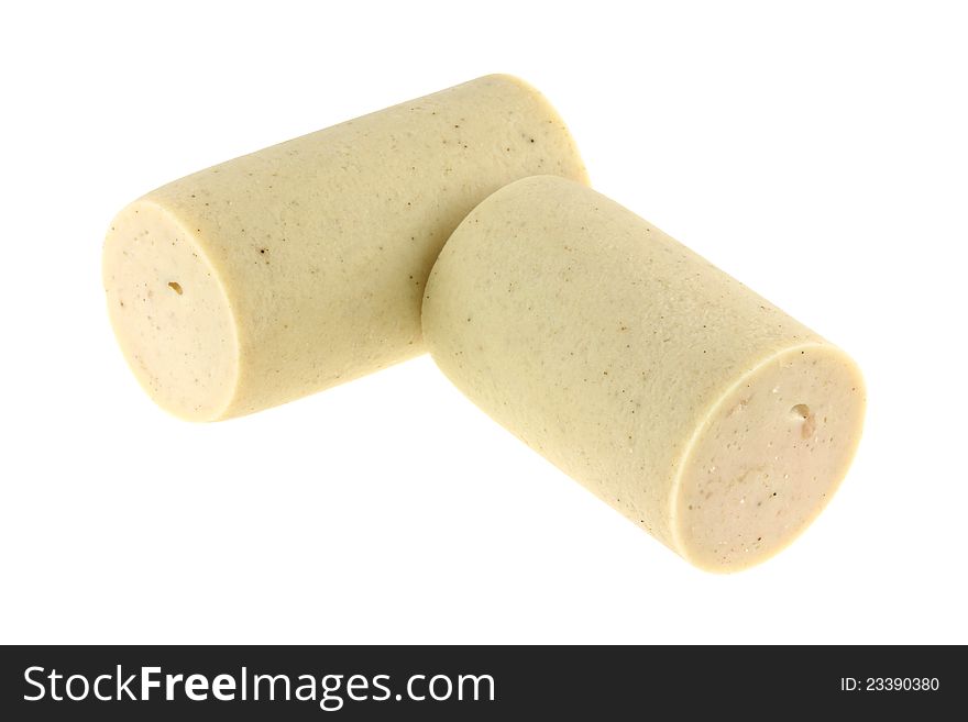 White seasoned pork sausage cut in half, isolated on white