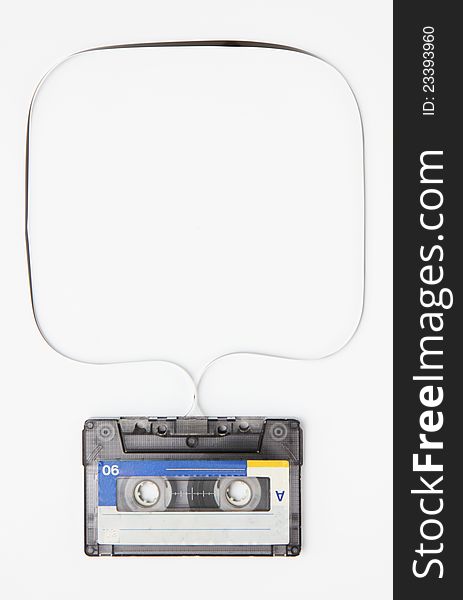 Close up of vintage audio tape on white background