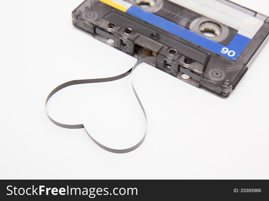 Close up of vintage audio tape on white background