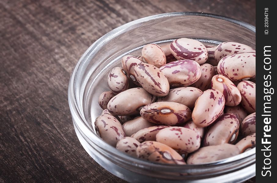 Close up photo of  beans in a glass bow