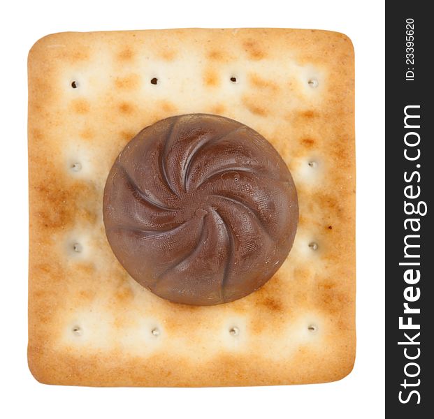 Round chocolate candy with crackers on a white background