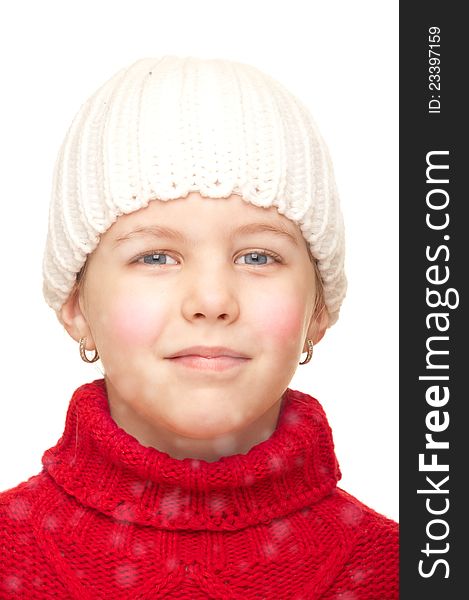 The girl in the snow with a white cap and a red turtleneck. The girl in the snow with a white cap and a red turtleneck