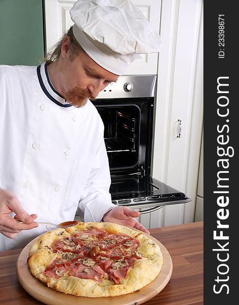Young chef prepared italian pizza