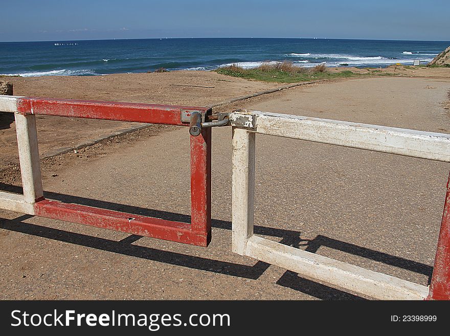 Closed and locked gates on the beach