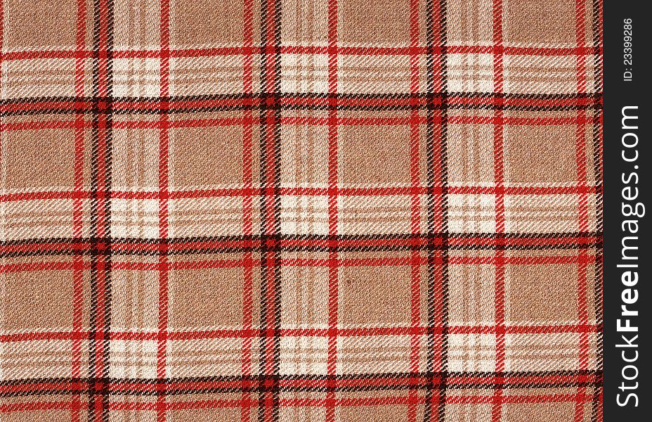 Scan of a piece classic scottish tartan fabric. Seamless square pattern. Scan of a piece classic scottish tartan fabric. Seamless square pattern.