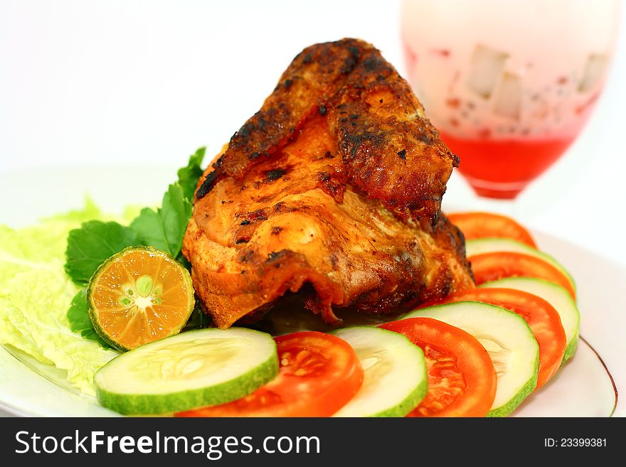 Roasted chicken with vegetables on white background. Roasted chicken with vegetables on white background