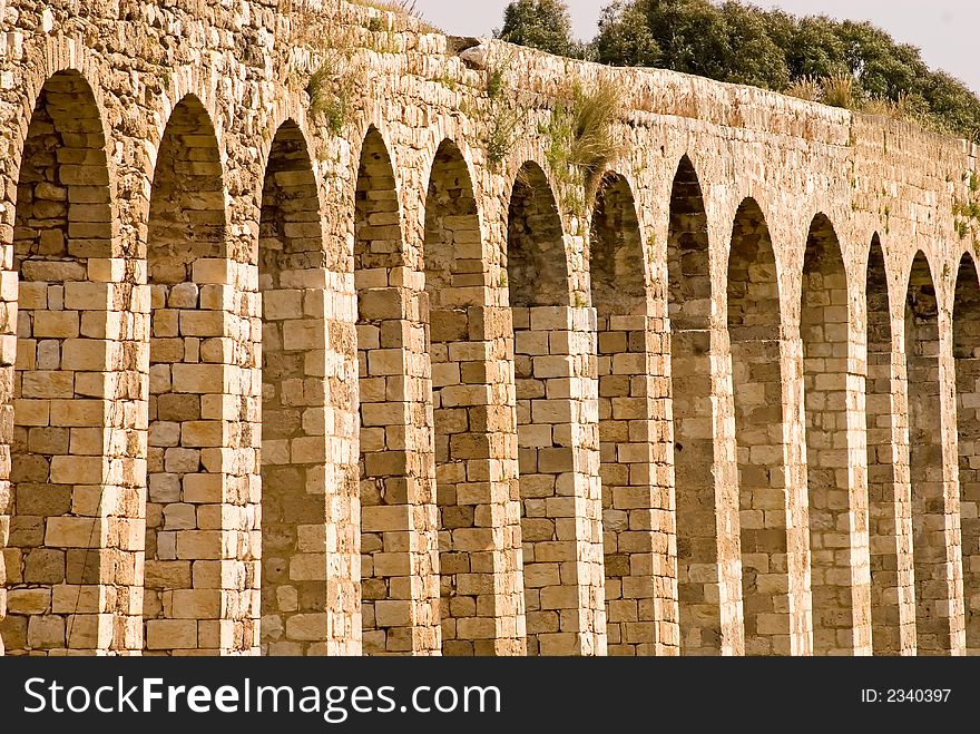 Arches of an ancient Roman aqueduct, Northern Galilee, Israel.