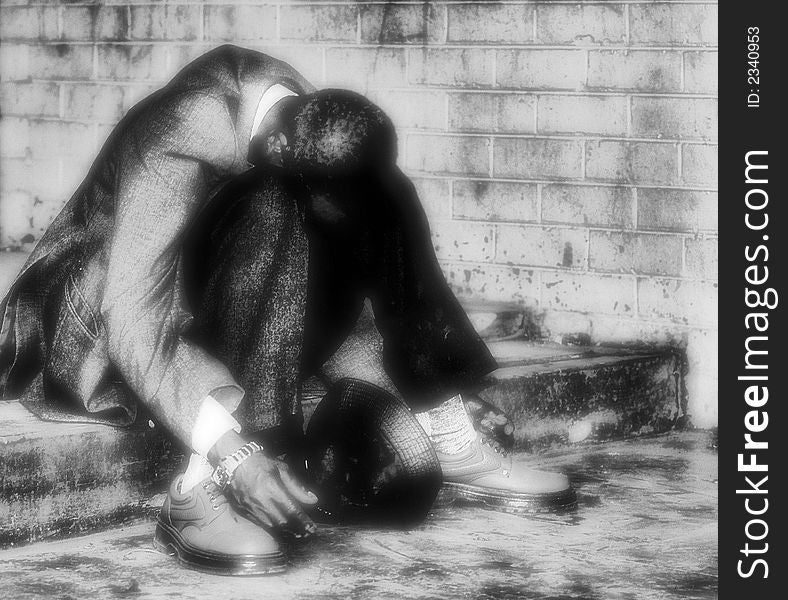 Stoned man that passed out on his knees. Hands hanging down. Artistic. Sepia and Infra Red manipulation. Stoned man that passed out on his knees. Hands hanging down. Artistic. Sepia and Infra Red manipulation