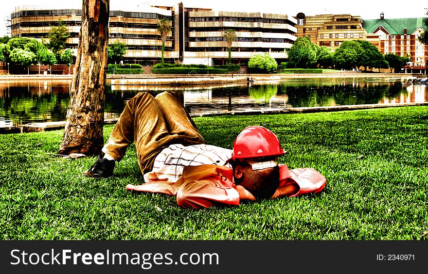 Lunchtime in Africa, man having a snooze during his lunch hour.