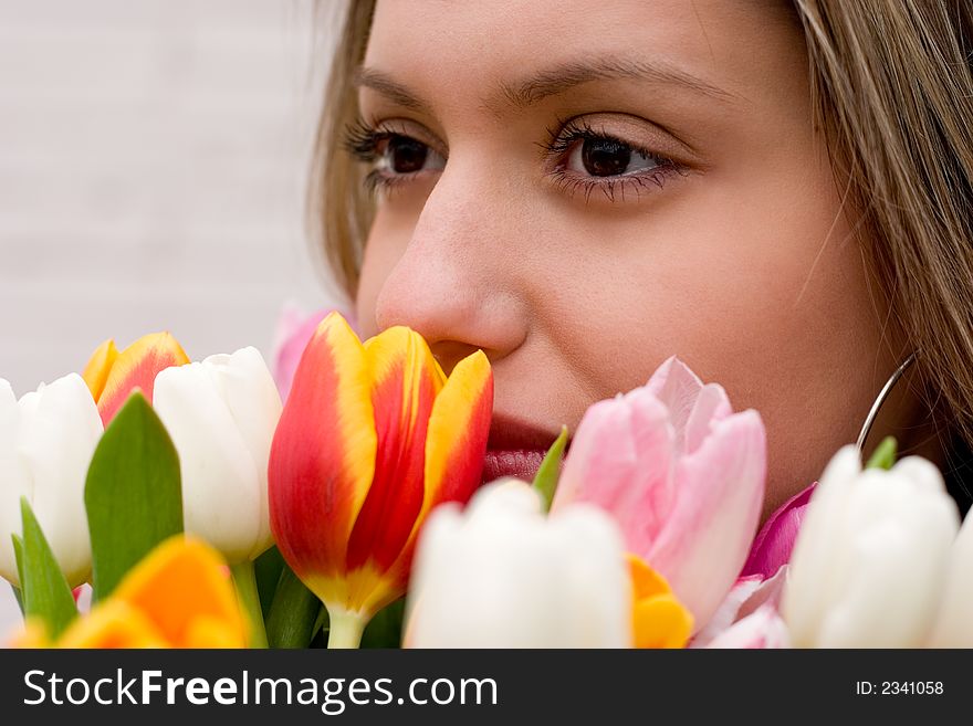 Girl with bouquet of tulips. Girl with bouquet of tulips