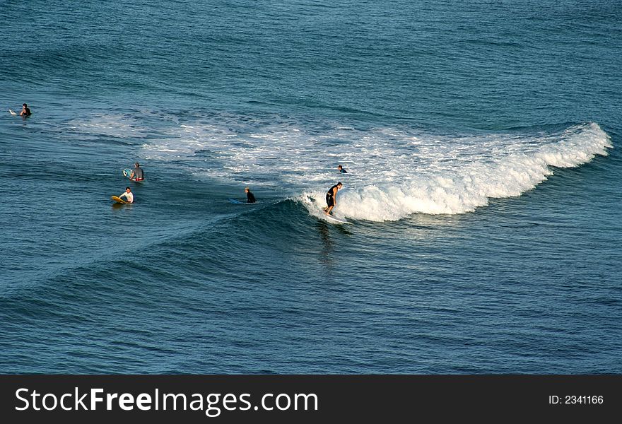 Surfer off Waikiki Beach, Honolulu, Hawaii, USA. Surfer off Waikiki Beach, Honolulu, Hawaii, USA