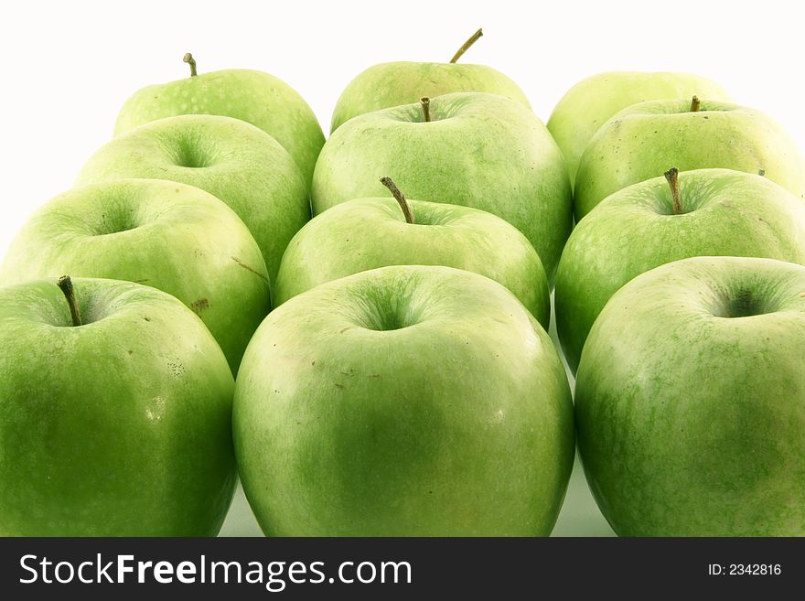 Green apples set on a white background