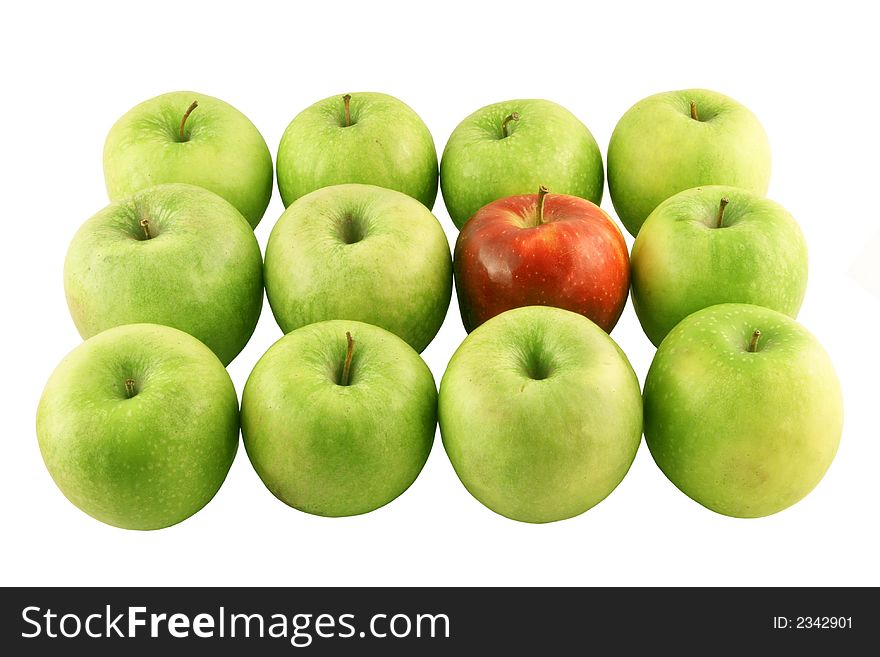 Green apples and a red one set on a white background