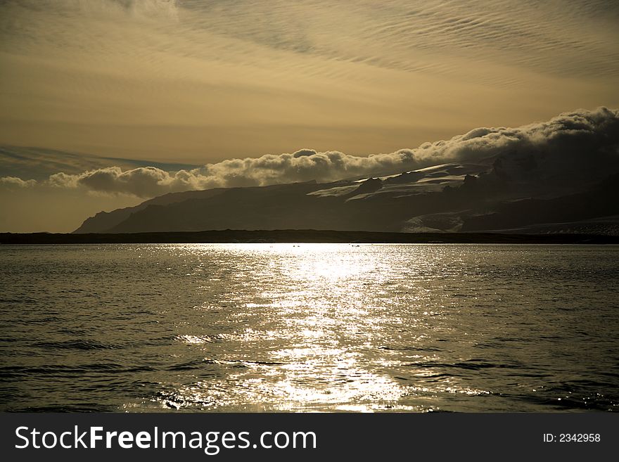 Sunset over the glacier on the southern coast of Iceland