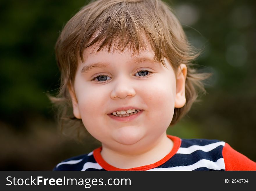 Smiling happy small child portrait. Smiling happy small child portrait