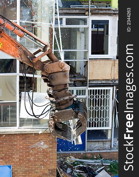 Demolition work involving the tearing out and smashing of windows. Demolition work involving the tearing out and smashing of windows