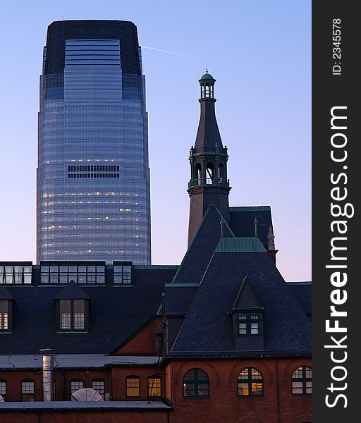 An old train station and a modern high-rise office building in New Jersey. An old train station and a modern high-rise office building in New Jersey