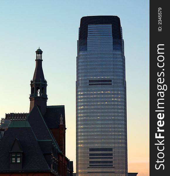 An old train station and a modern high-rise office building in New Jersey. An old train station and a modern high-rise office building in New Jersey