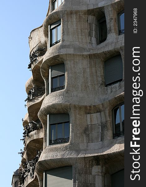 Casa Milla Perspectice vieuw of the front building and blue sky by Antoni Gaudi Barcelona Spain