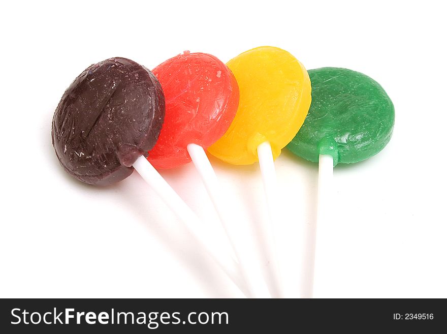 Picture of 4 lollipops on white upclose