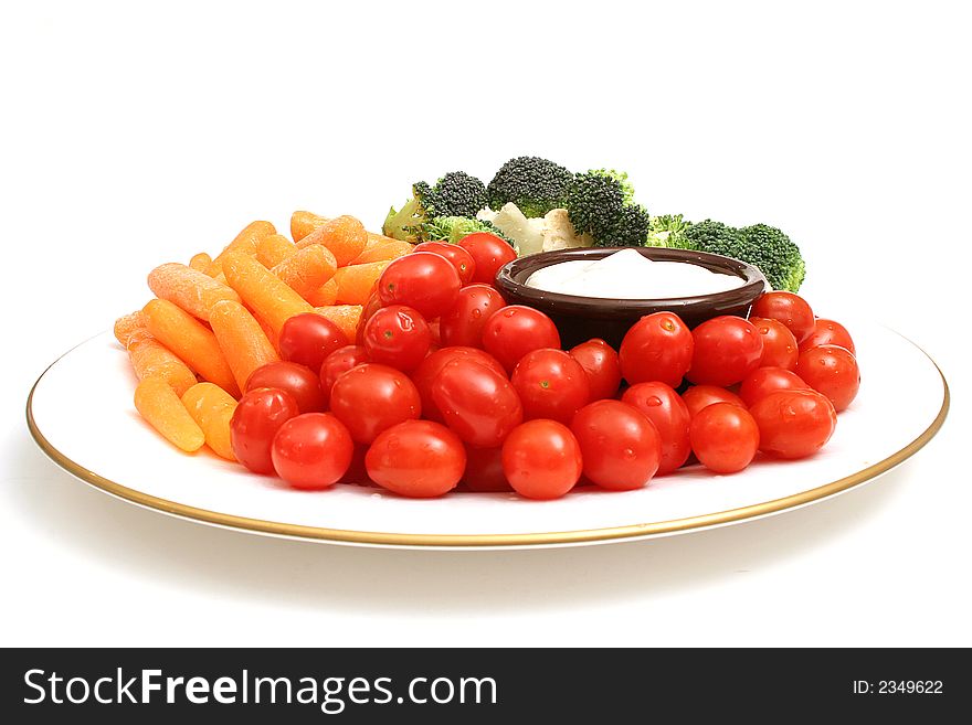 Picture of a plate of veggies on white