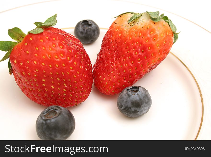 Picture of Two strawberries & blueberries angle