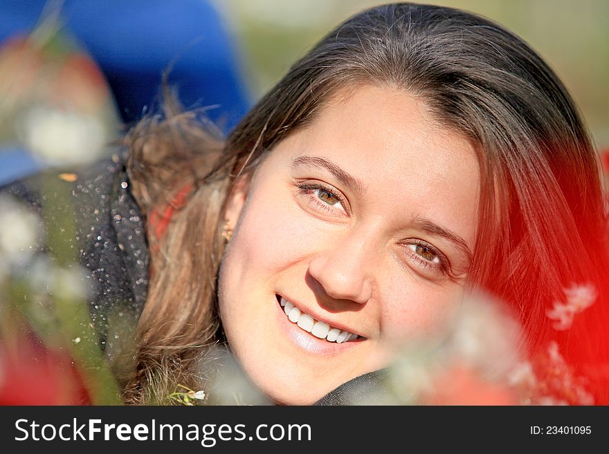 Portrait of a young smiling pretty girl outdoors. Portrait of a young smiling pretty girl outdoors
