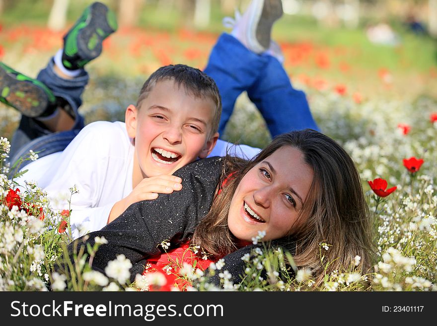 Mother And Son Fool Around In The Park